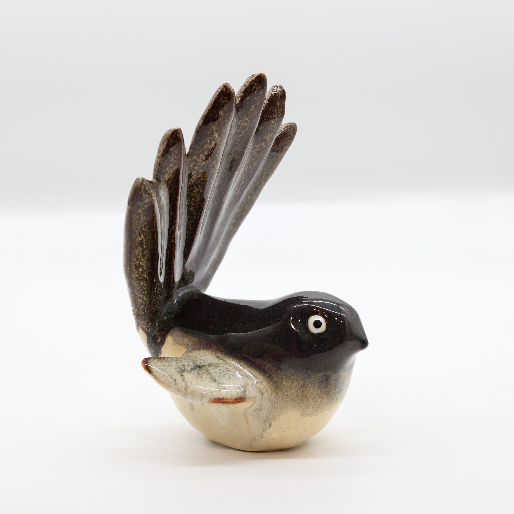 Pīwakawaka ceramic sculpture scale reference photo