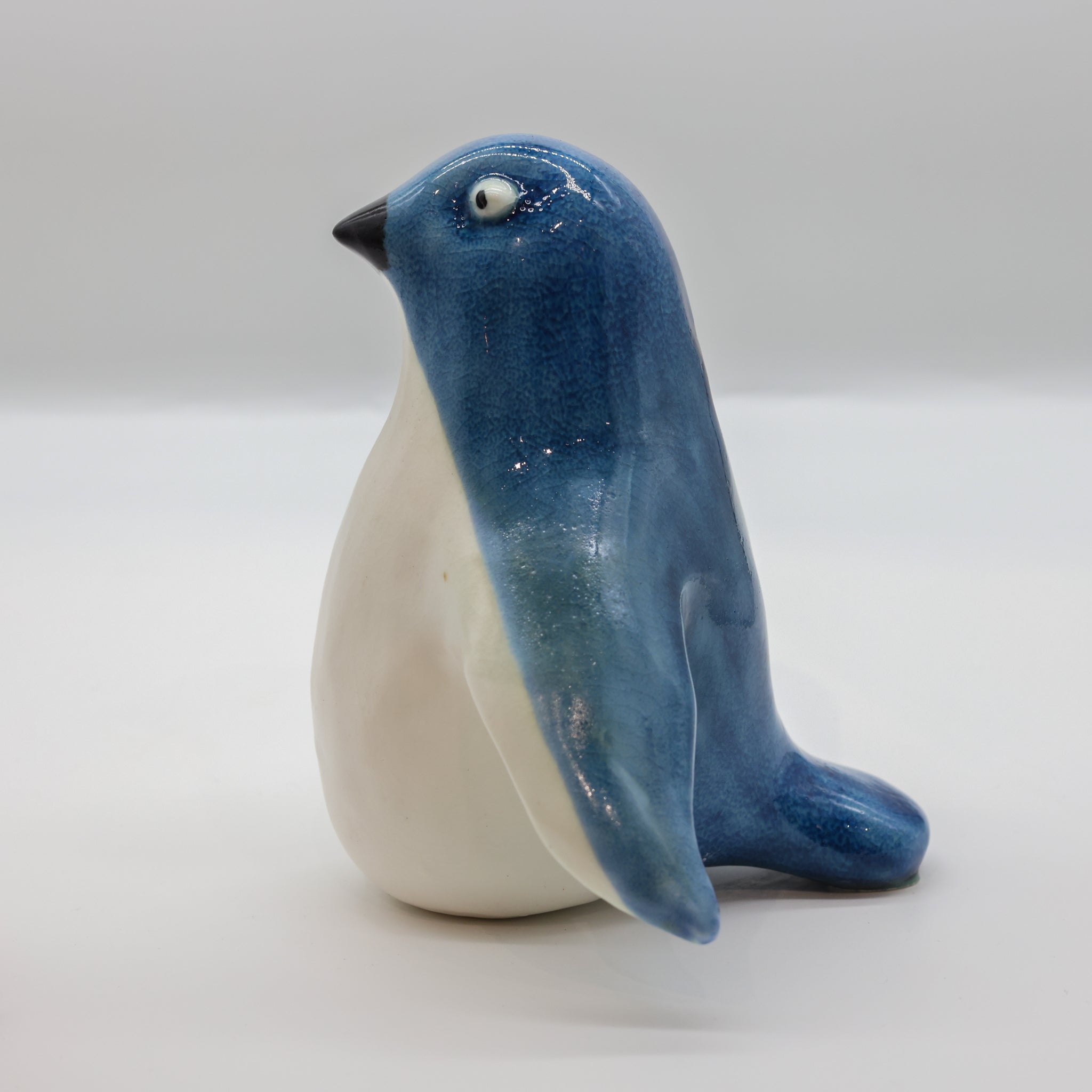 Korōrā ceramic sculpture, alternate angle showing porcelain glaze