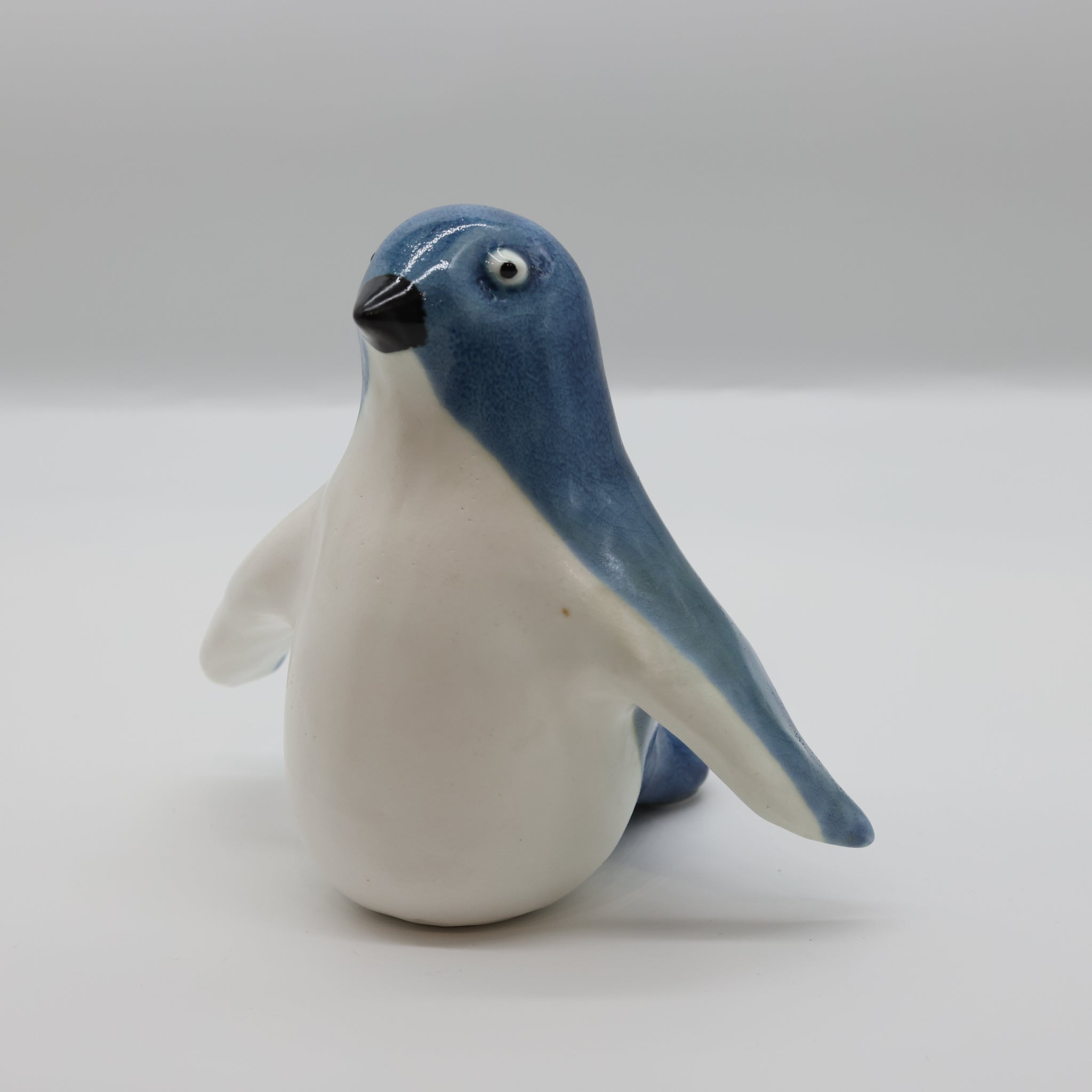 Korōrā (little blue penguin) ceramic sculpture handcrafted in Arrowtown, New Zealand
