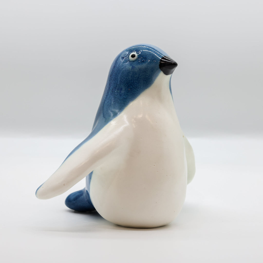 Handcrafted ceramic little blue penguin sculpture, Cheeky Beaks collection