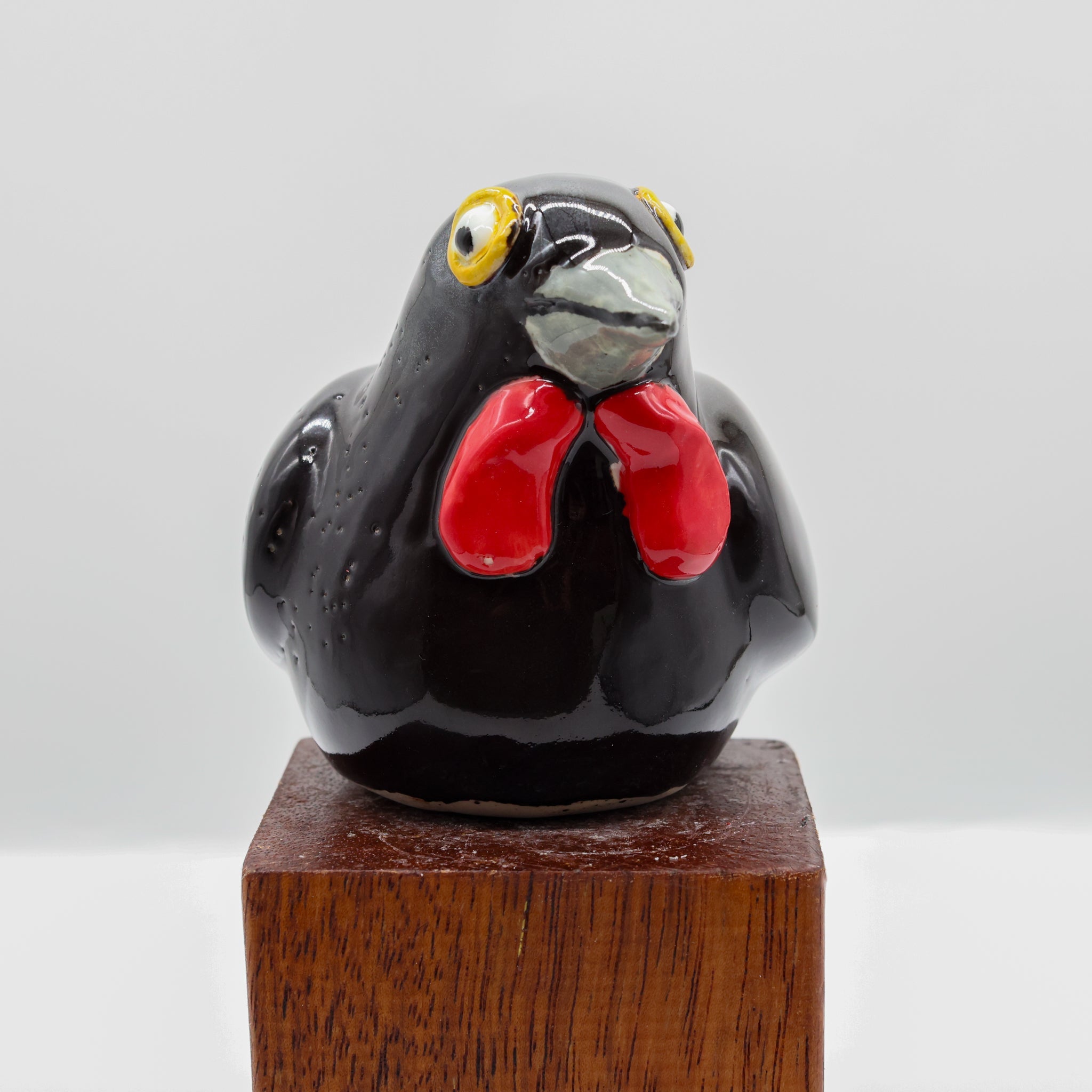 Tīeke ceramic sculpture, alternate angle showing porcelain glaze