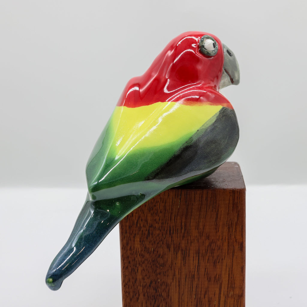 Eastern Rosella ceramic sculpture, alternate angle showing porcelain glaze