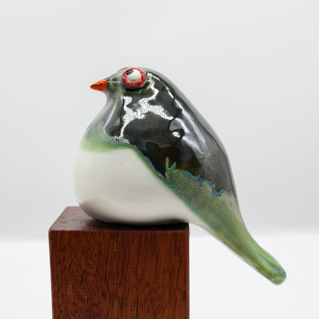 Kererū ceramic sculpture, alternate angle showing porcelain glaze