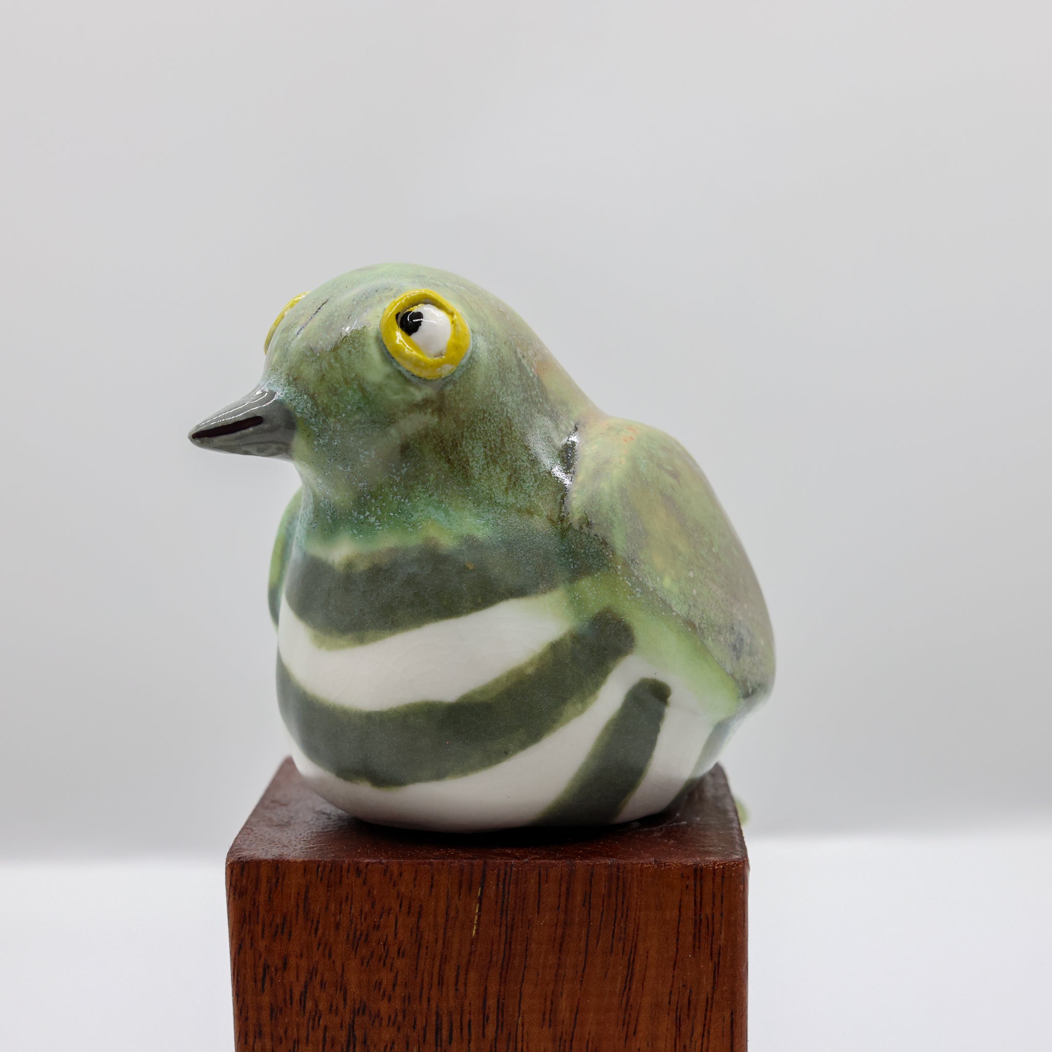 Handcrafted ceramic shining cuckoo sculpture, Cheeky Beaks collection