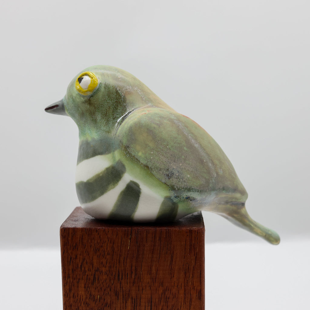 Pīpīwharauroa ceramic sculpture, alternate angle showing porcelain glaze