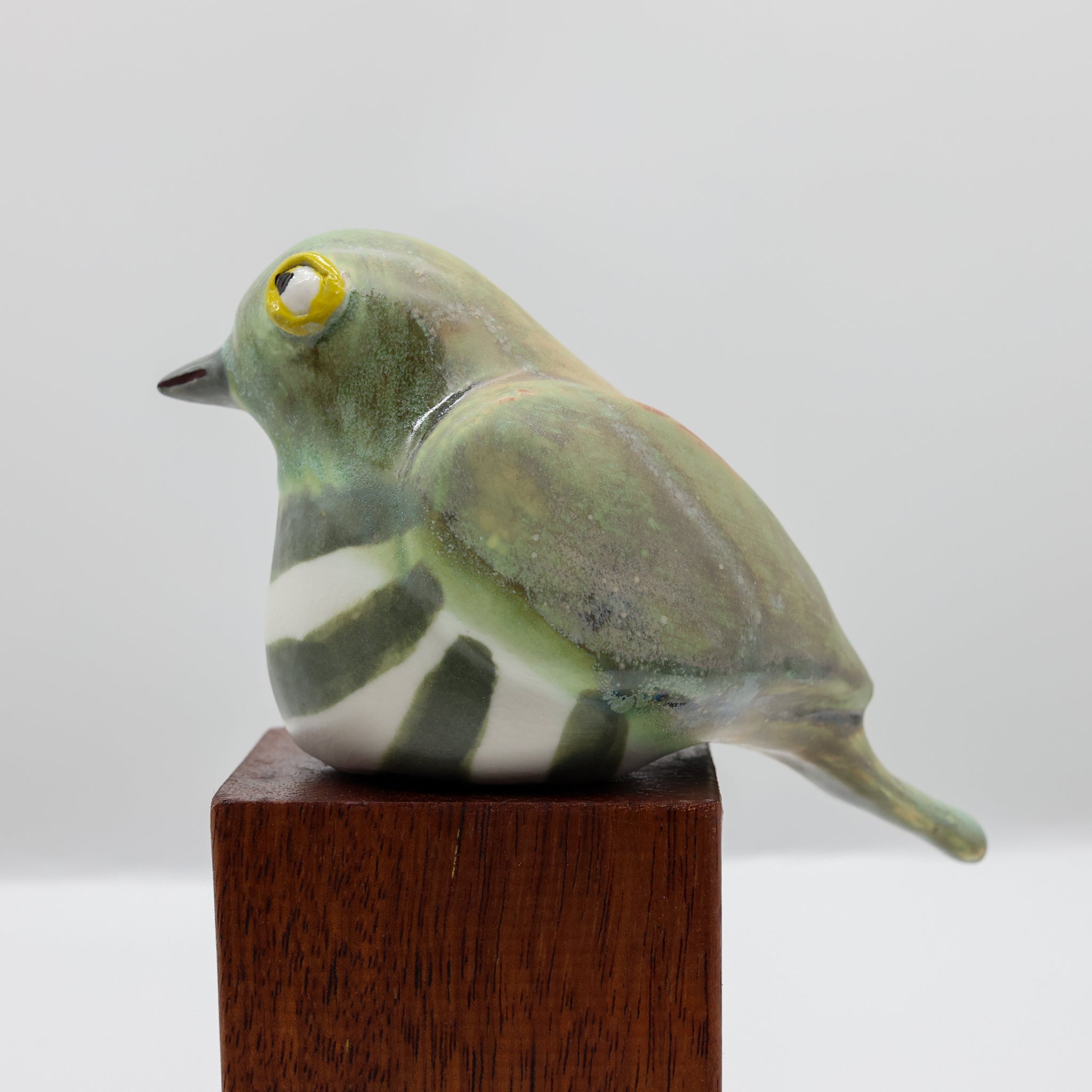 Pīpīwharauroa ceramic sculpture, alternate angle showing porcelain glaze
