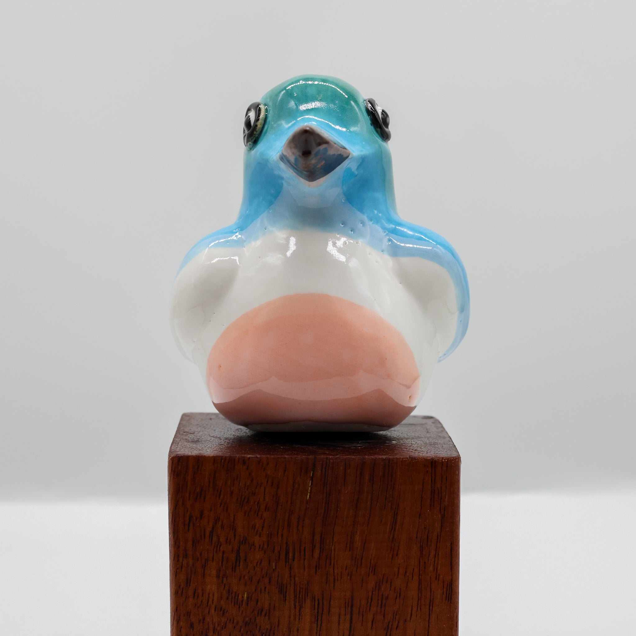 Kōtare ceramic sculpture, alternate angle showing porcelain glaze
