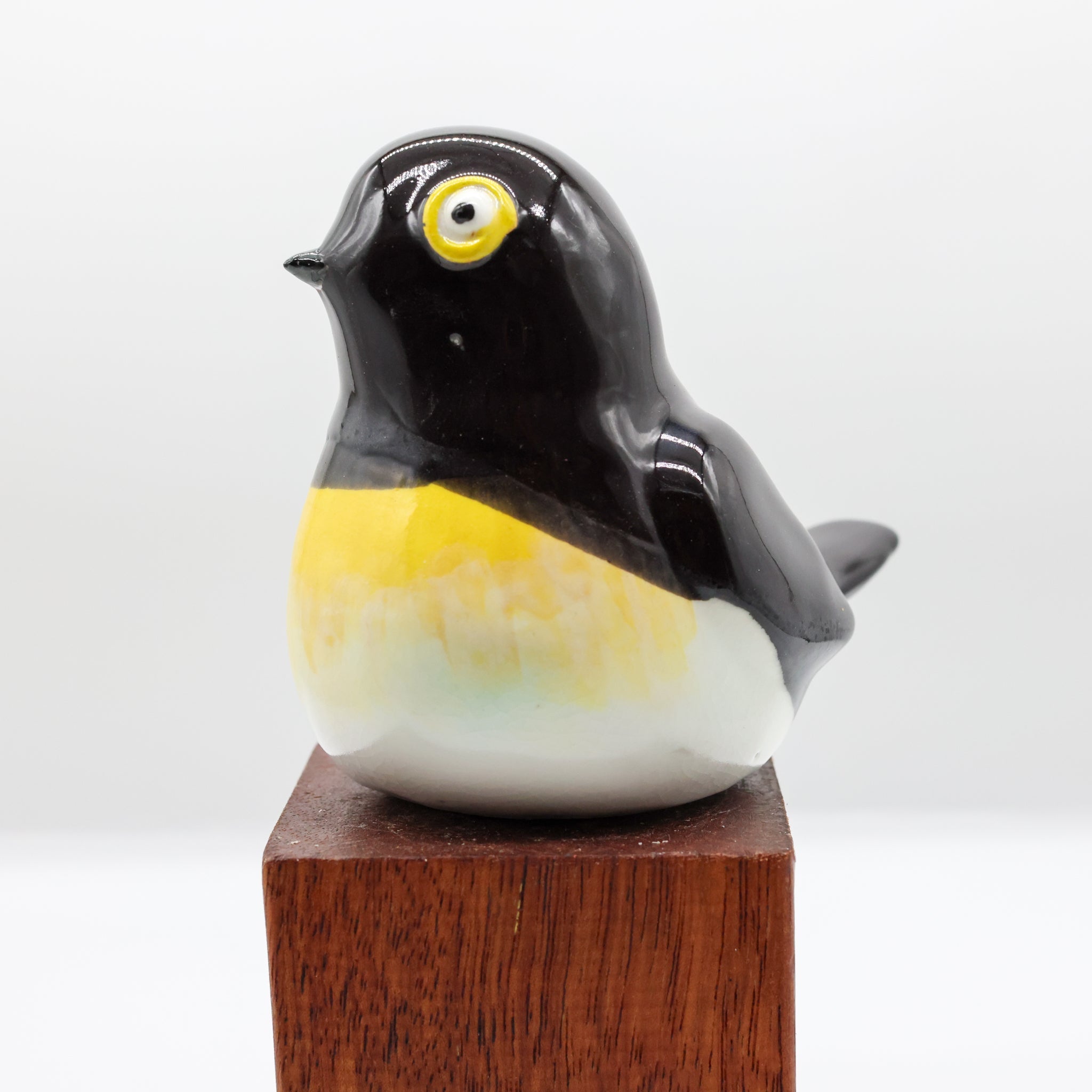Miromiro ceramic sculpture, alternate angle showing porcelain glaze