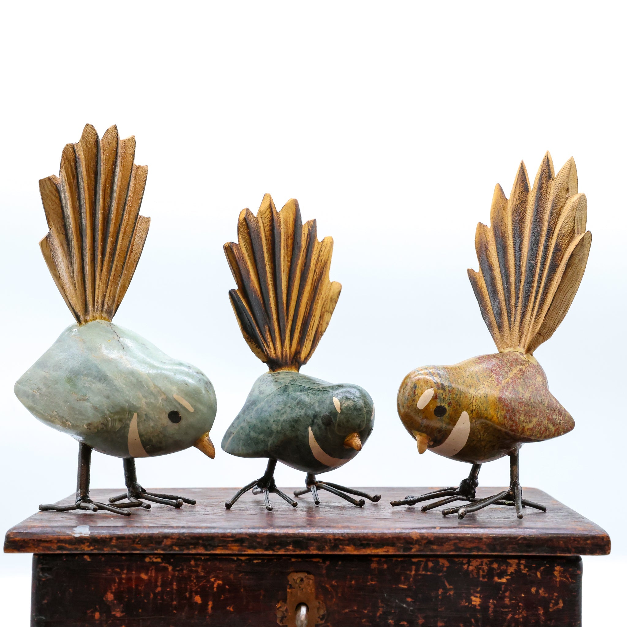 Handcrafted stone fantail bird sculpture, Wings of Stone collection