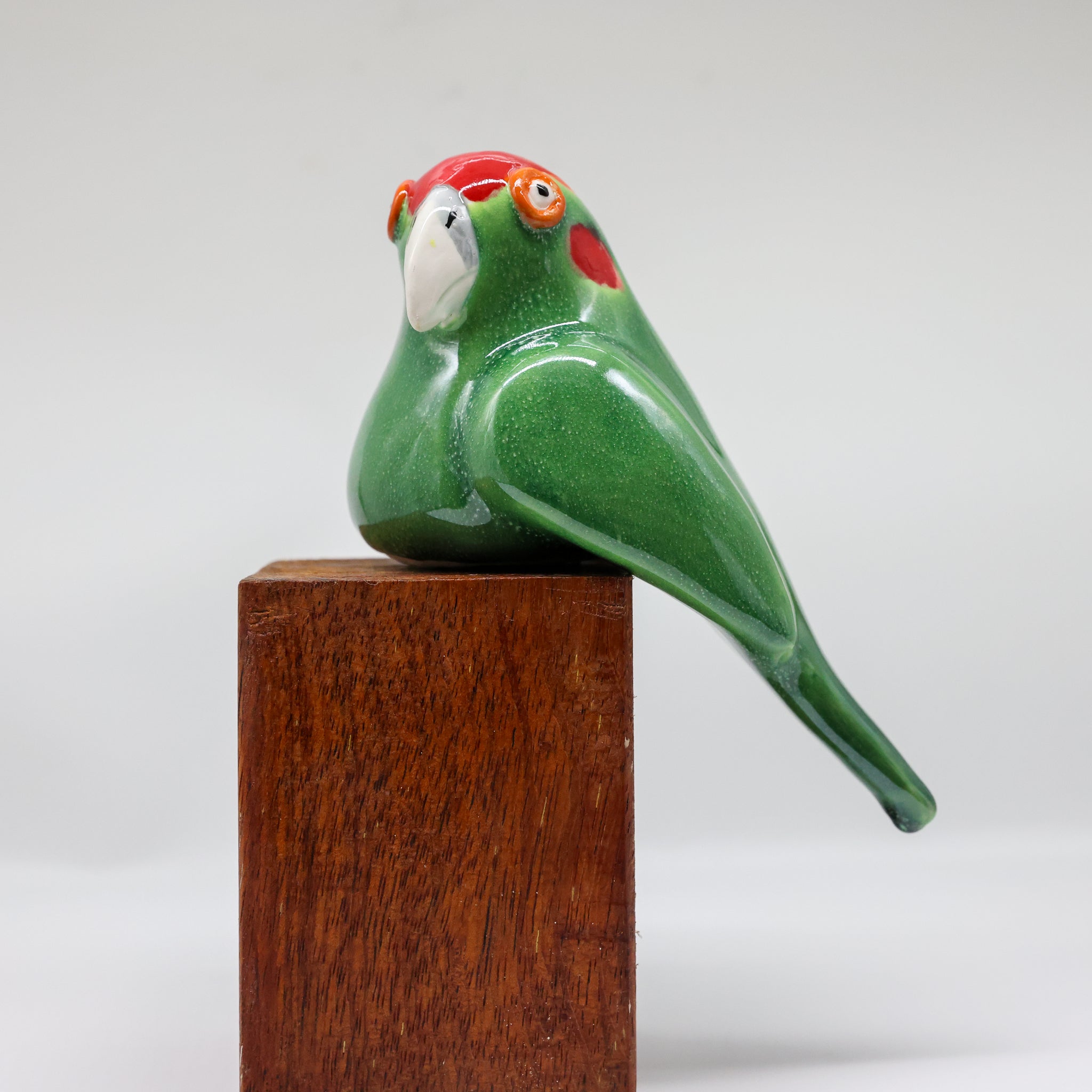 Kākāriki ceramic sculpture handcrafted in Arrowtown, New Zealand