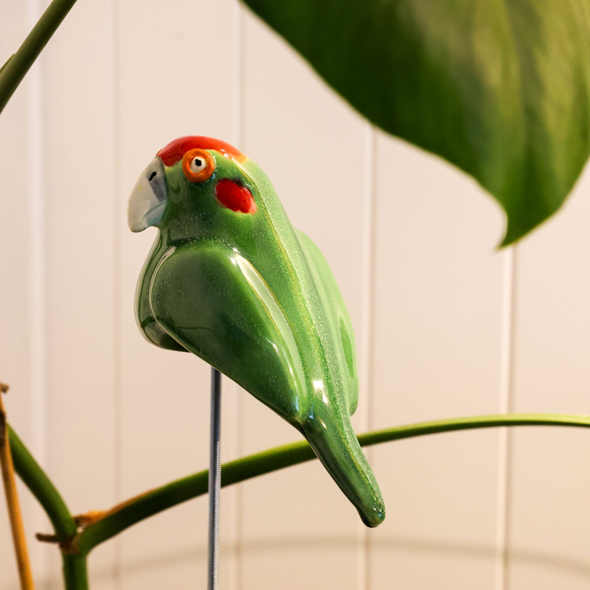 Handcrafted ceramic kākāriki sculpture, Cheeky Beaks collection